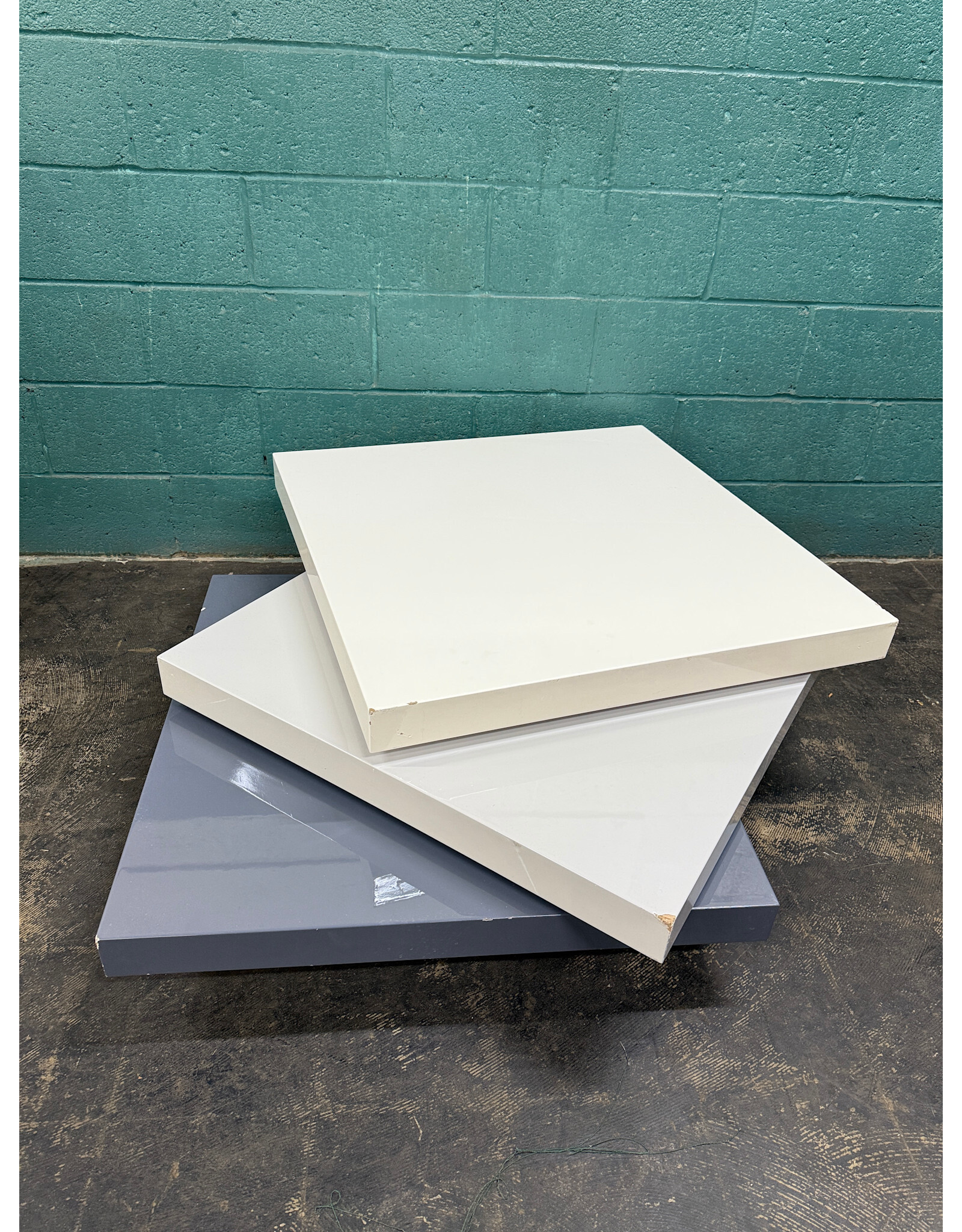 Modern Swivel Coffee Table With A Glossy White & Gray Finish