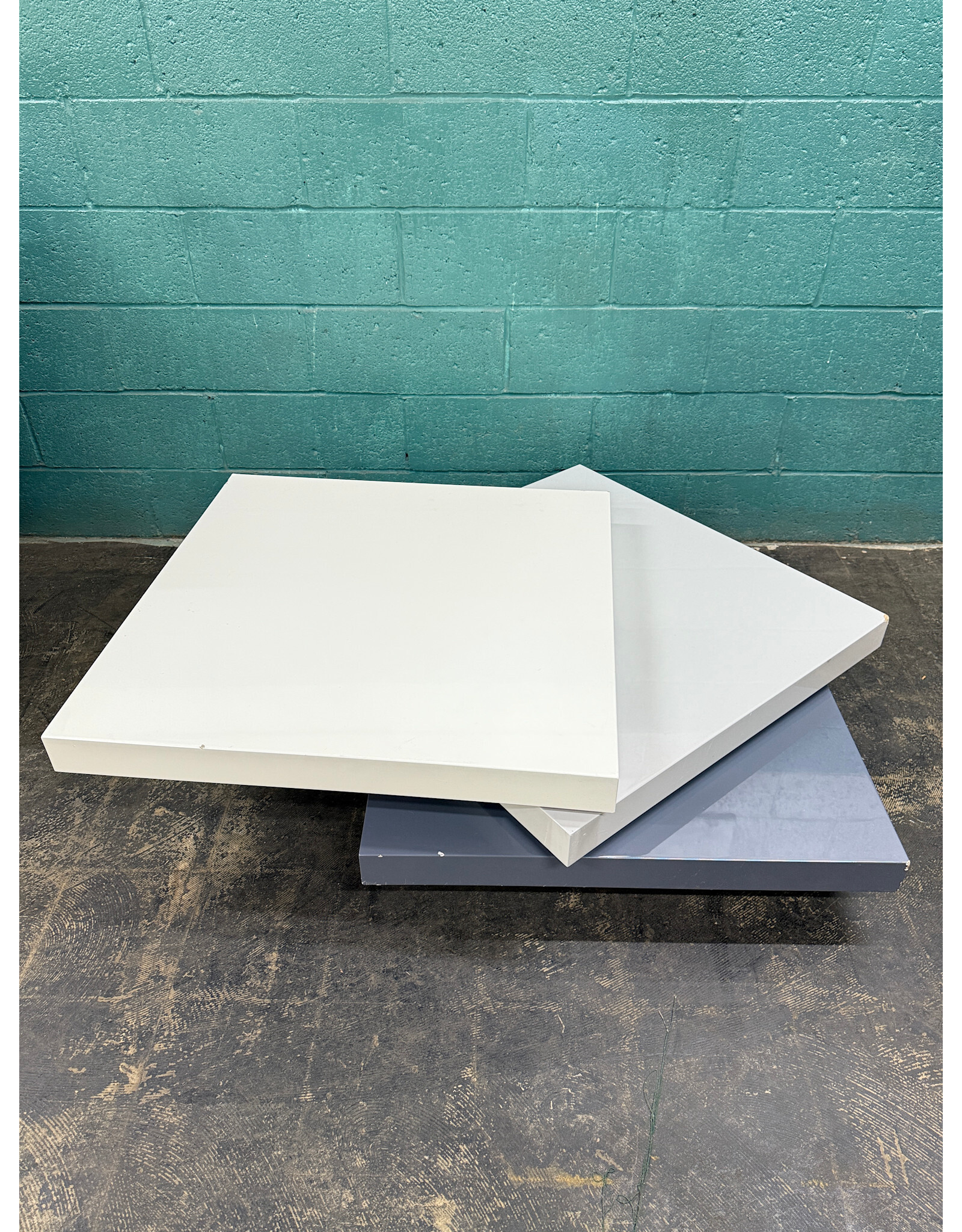 Modern Swivel Coffee Table With A Glossy White & Gray Finish