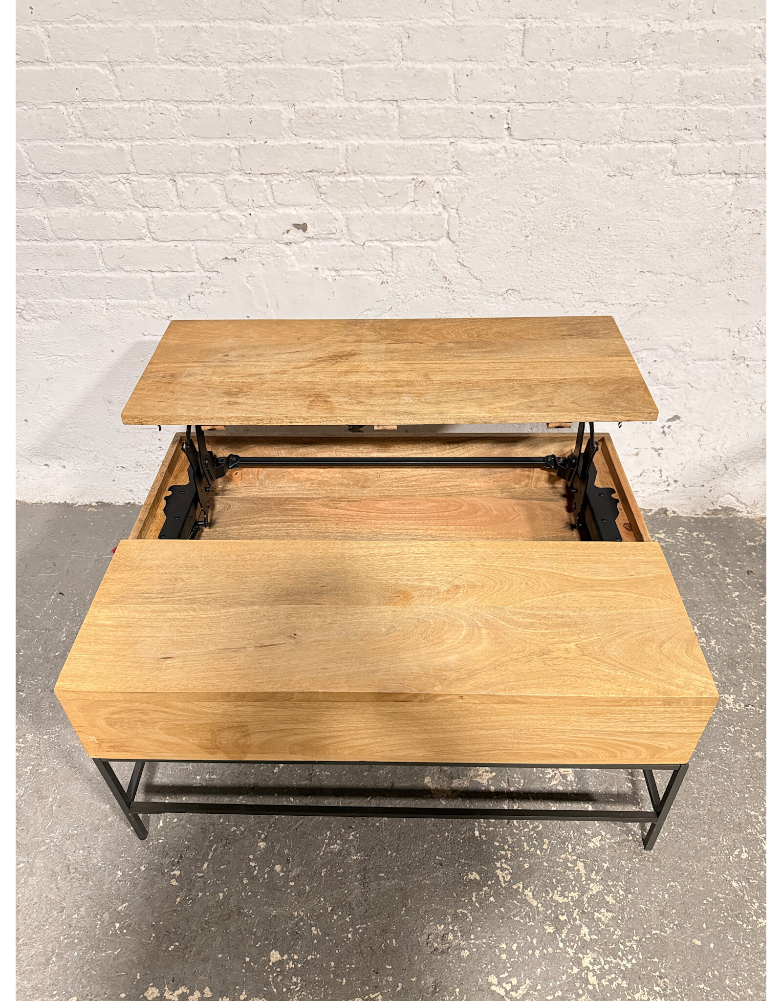 West Elm Industrial Pop-up Storage Coffee Table by West Elm in that Raw Mango