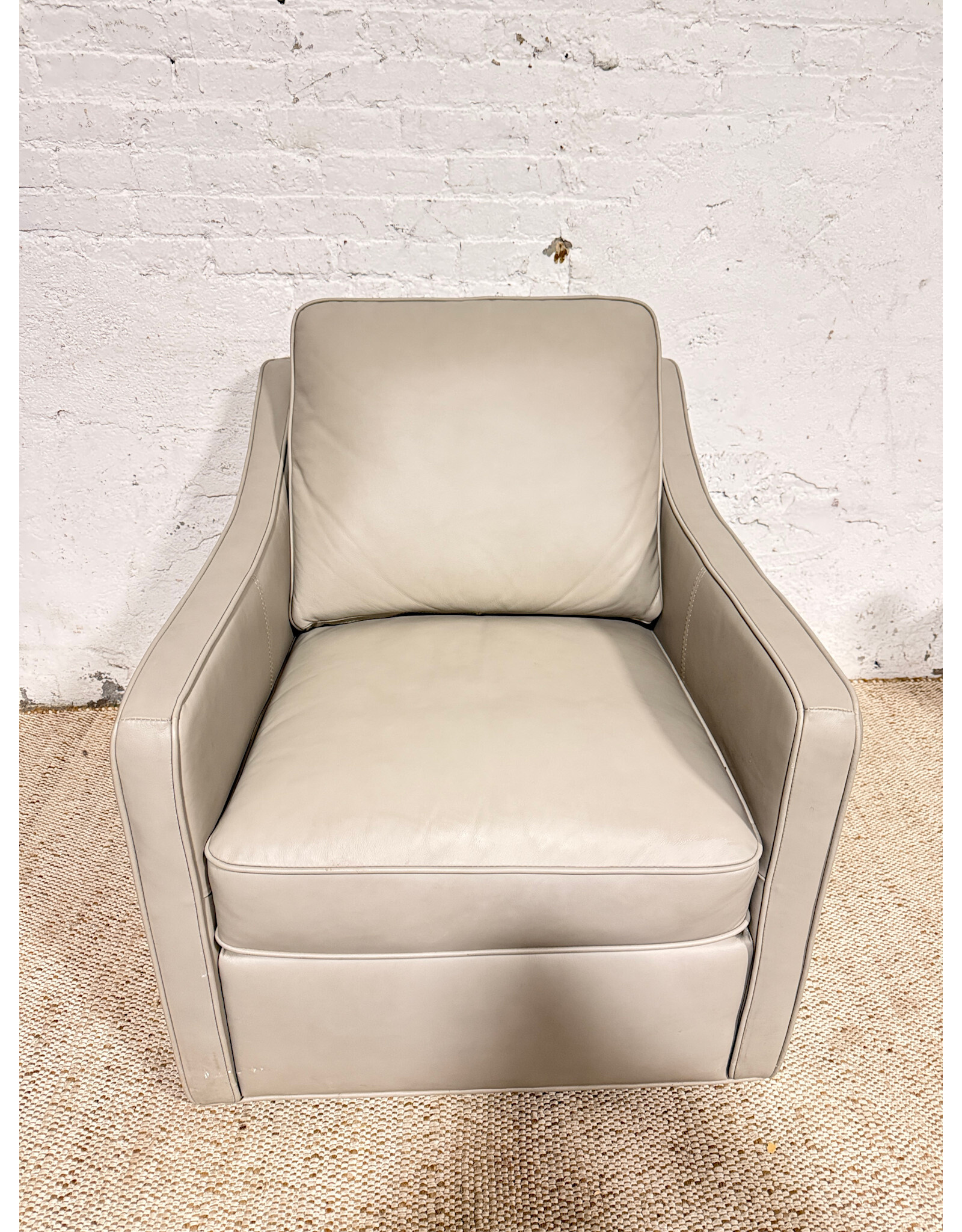 Trayton Grey Leather Swivel Lounge Chair