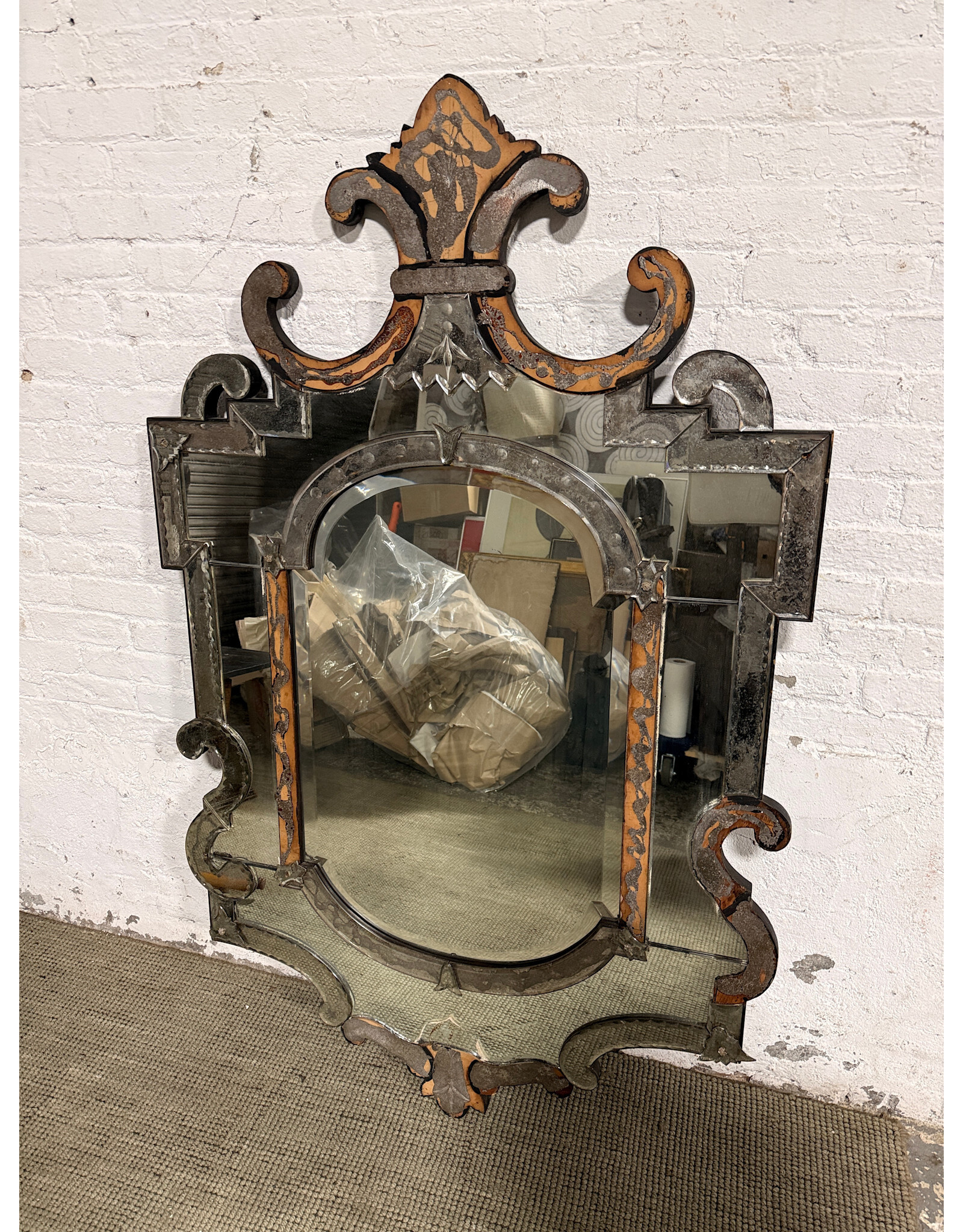 18th-Century Venetian Mirror, Featuring An Ornate, Contoured Frame.