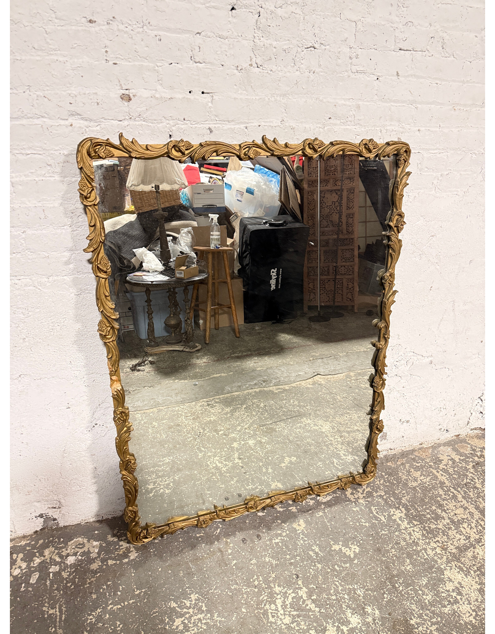 19th-Century French Napoleon III Giltwood Mirror Featuring An Ornate Carved Framed