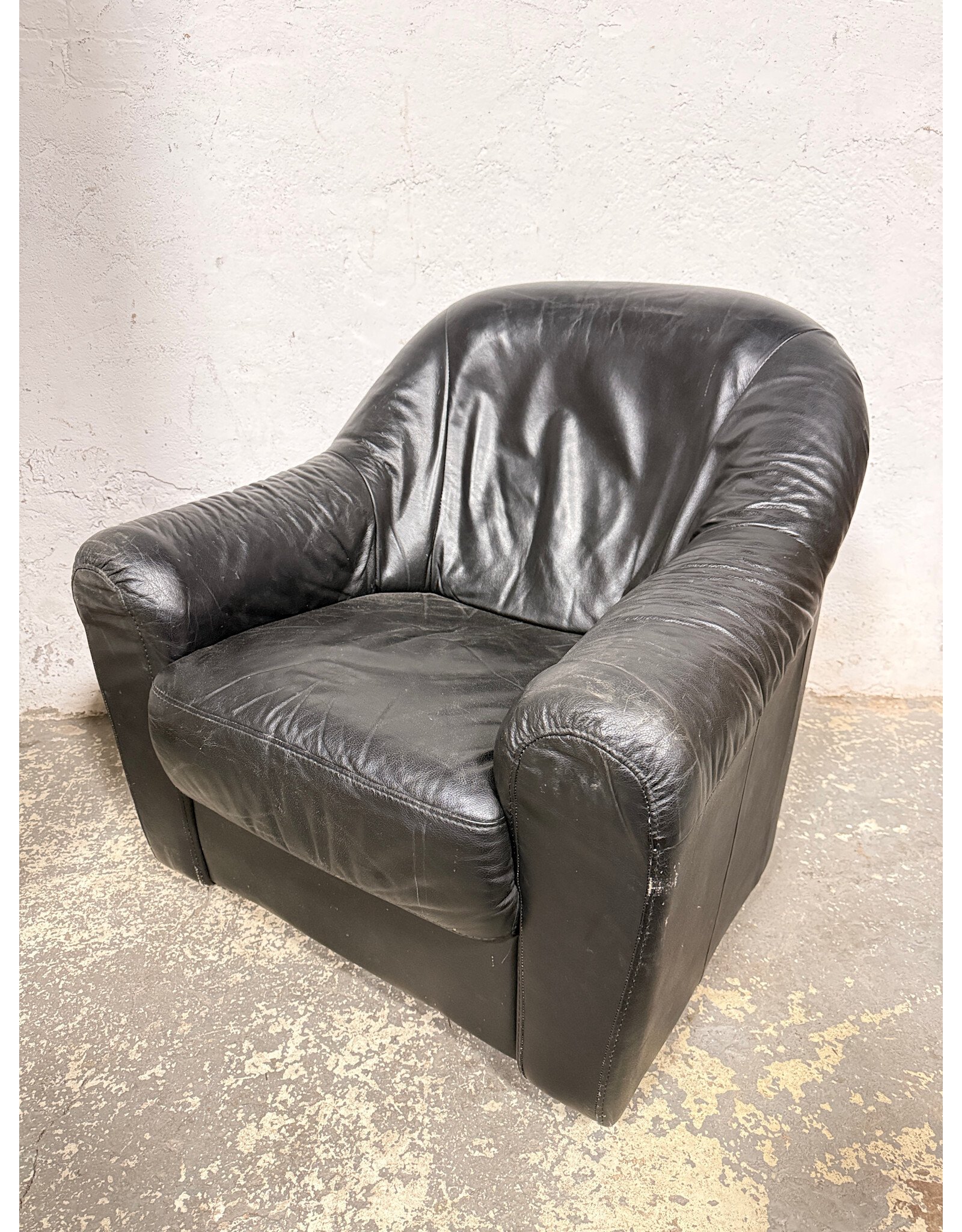 Black Faux Leather Rounded Armchair