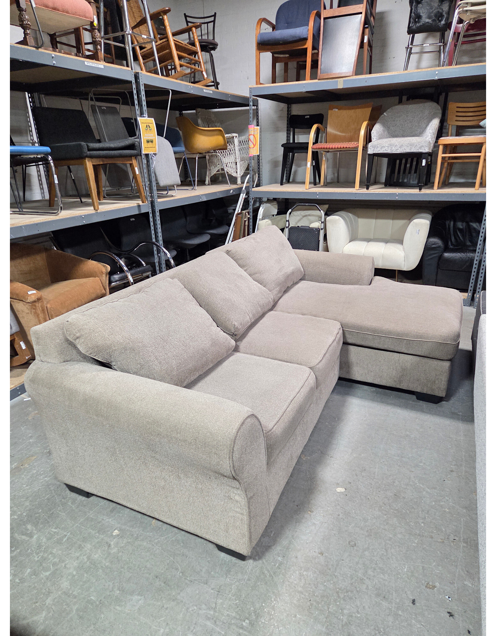 Ashley Furniture Gray 2-Piece Sectional Sofa with Ottoman