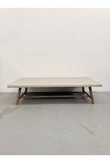 Crate & Barrel Fen Rectangular Outdoor Coffee Table with a concrete top and teak wood legs