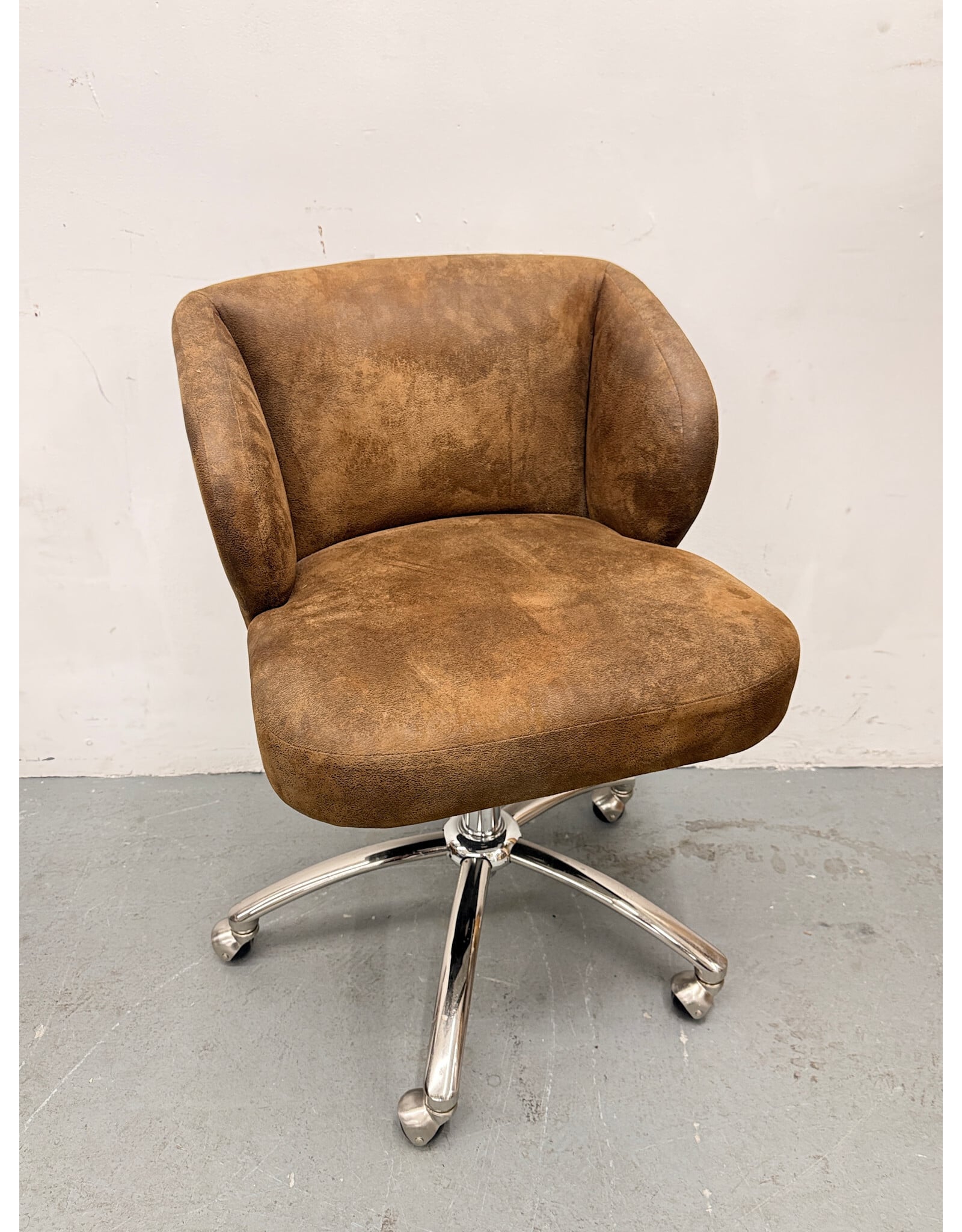 Pottery Barn Teen Wingback Swivel Desk Chair in faux leather caramel.