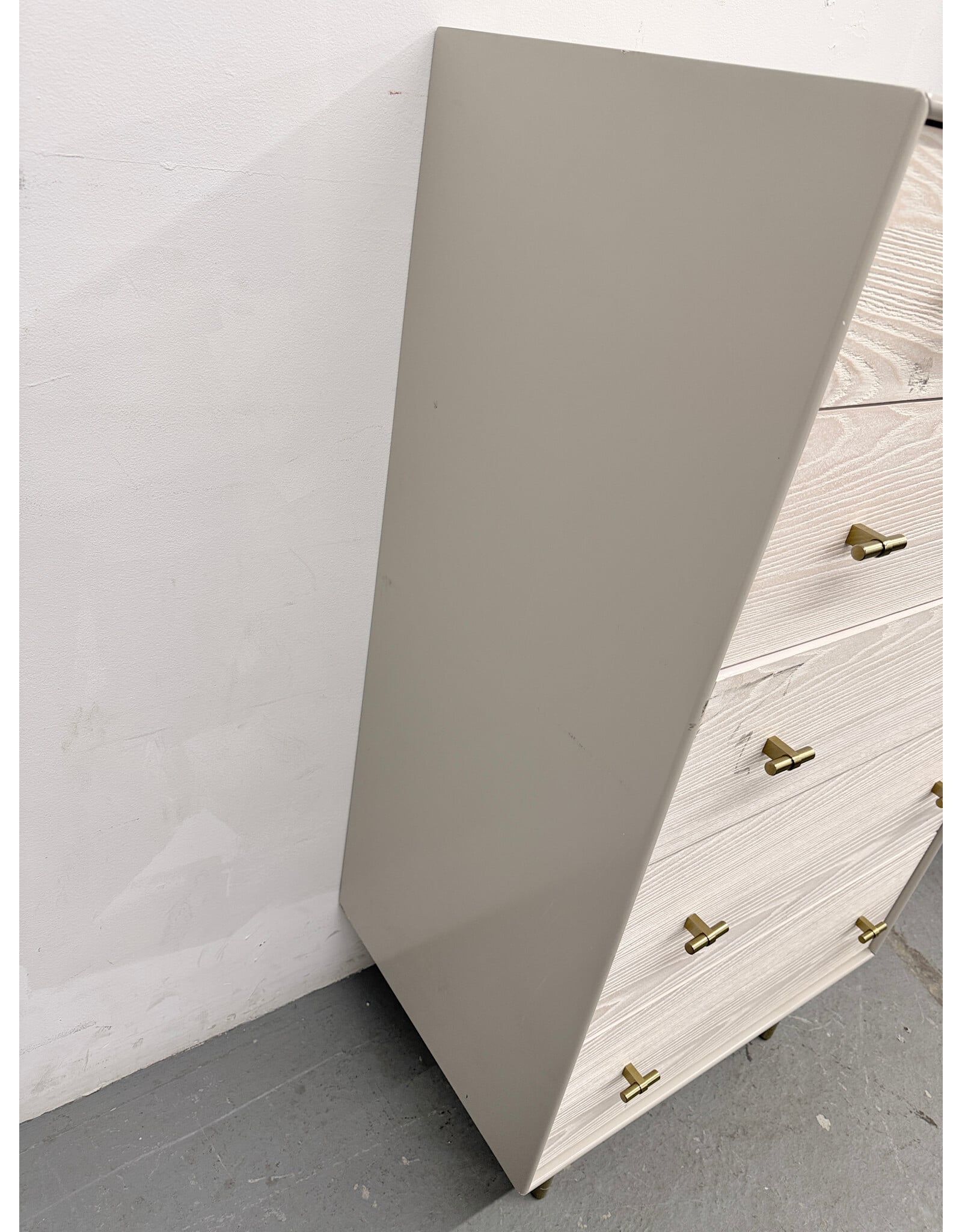West Elm Modernist Wood & Lacquer 5-Drawer Dresser in a winter wood finish.
