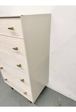 West Elm Modernist Wood & Lacquer 5-Drawer Dresser in a winter wood finish.