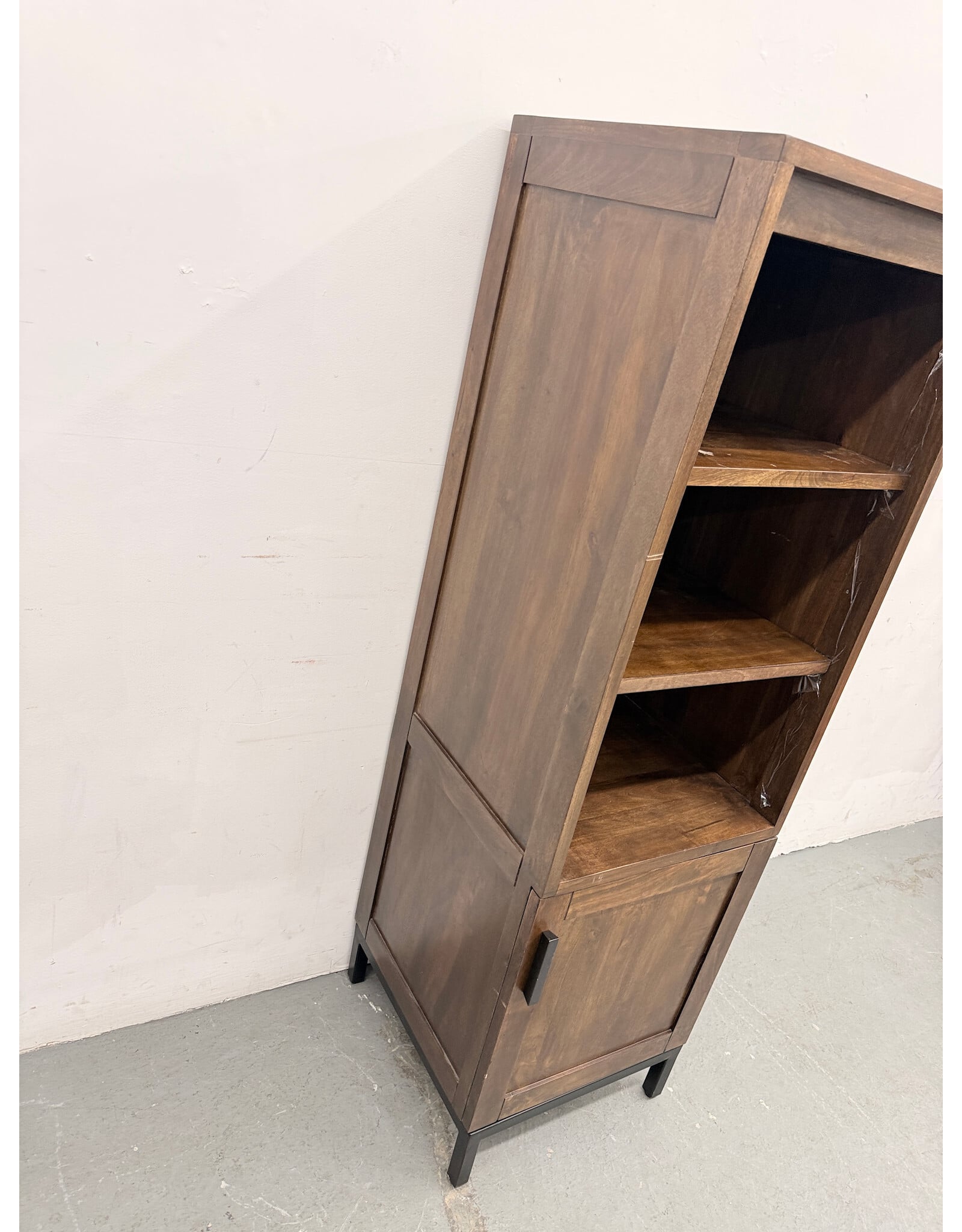 Crate & Barrel Wyatt Grey Media Storage Tower with three open shelves and a lower cabinet