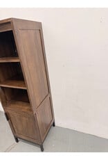 Crate & Barrel Wyatt Grey Media Storage Tower with three open shelves and a lower cabinet
