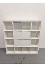 white IKEA KALLAX shelving unit with multiple storage