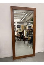 mid-century modern style rectangular mirror with a dark wood frame