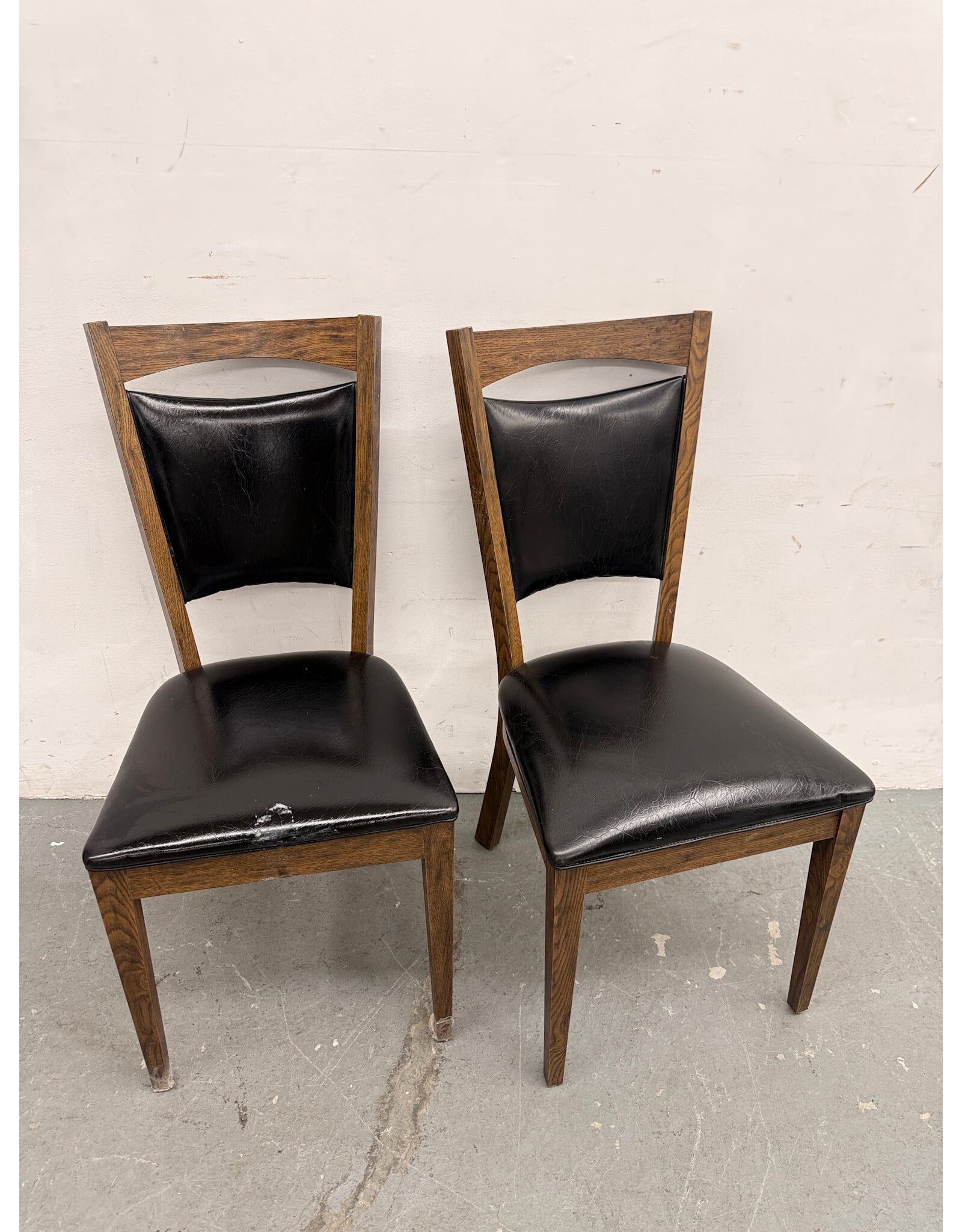 Black Leather and Wood Peephole Dining Chairs