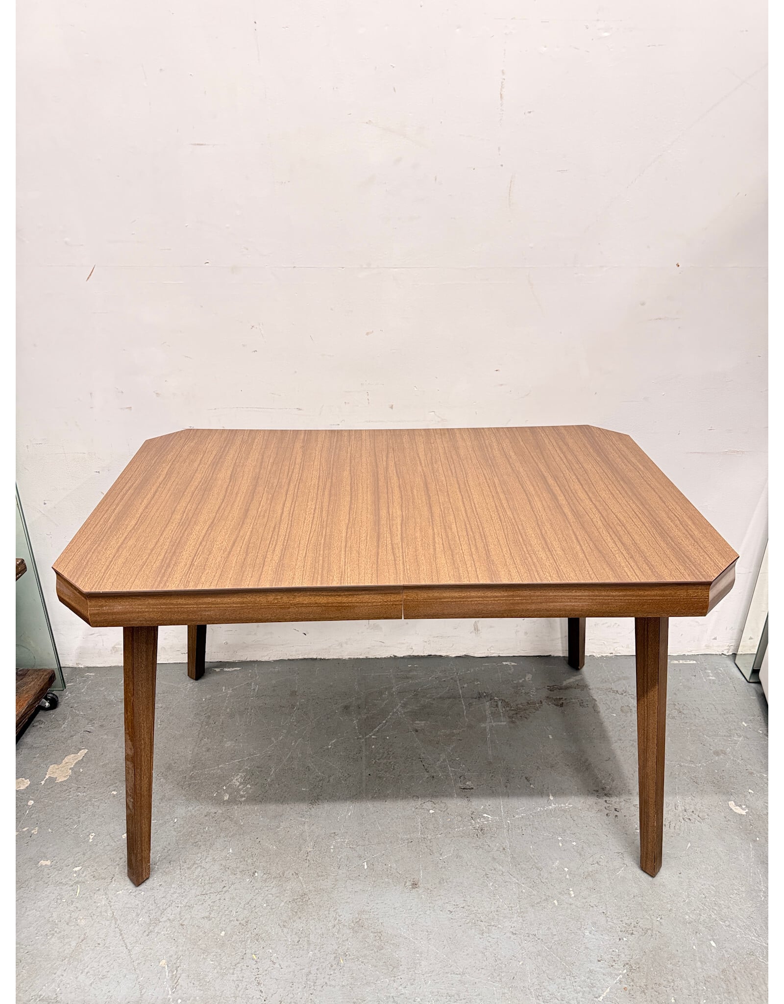 Ashley Lyncott Style Dining Table in a Rich Brown Finish