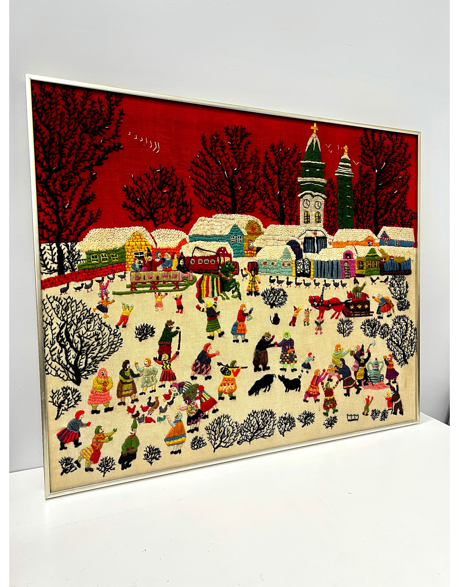 Holiday Village Scene, framed surface embroidery, by Madeline Morrissey