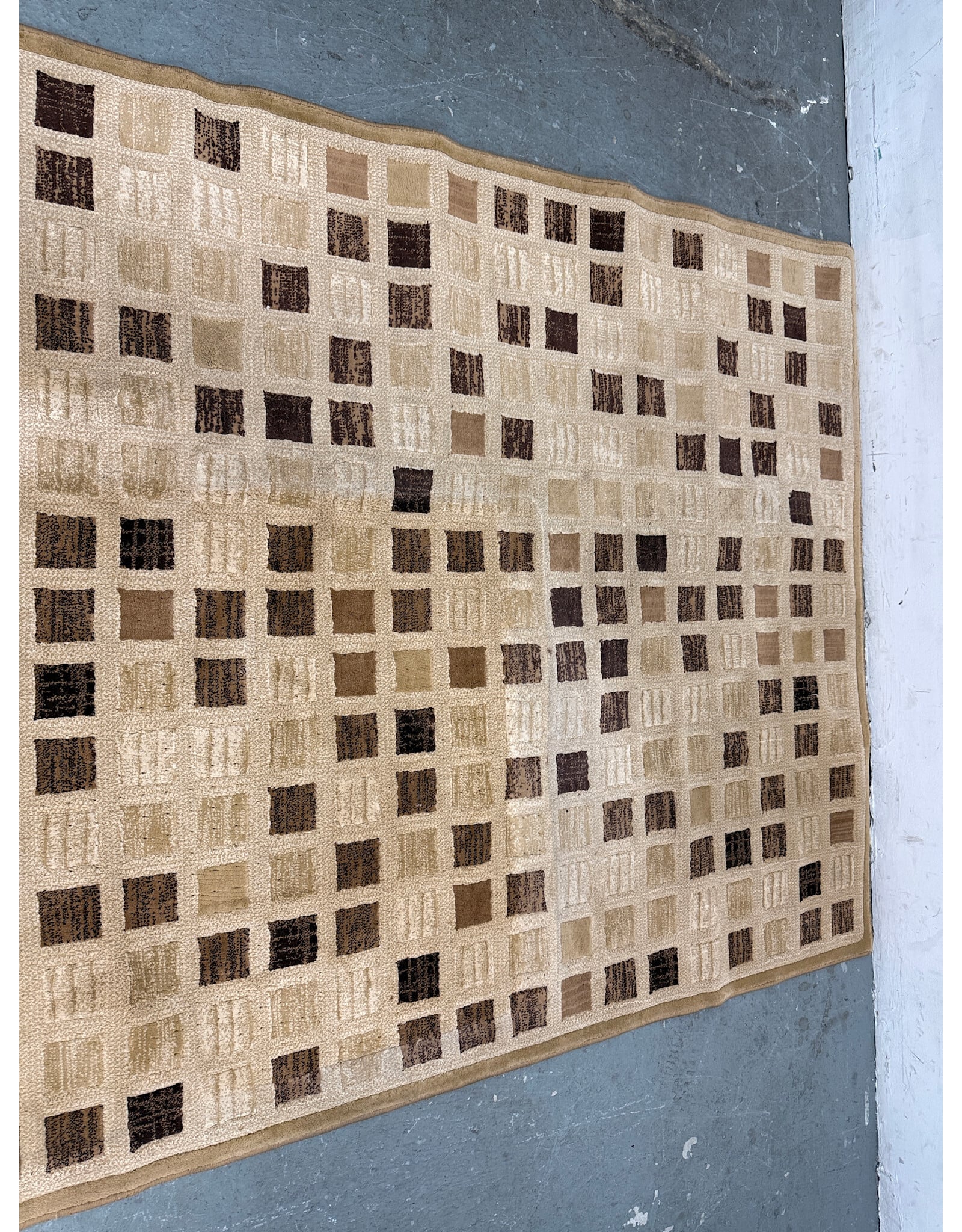 Beige Area Rug with Checkered Pattern