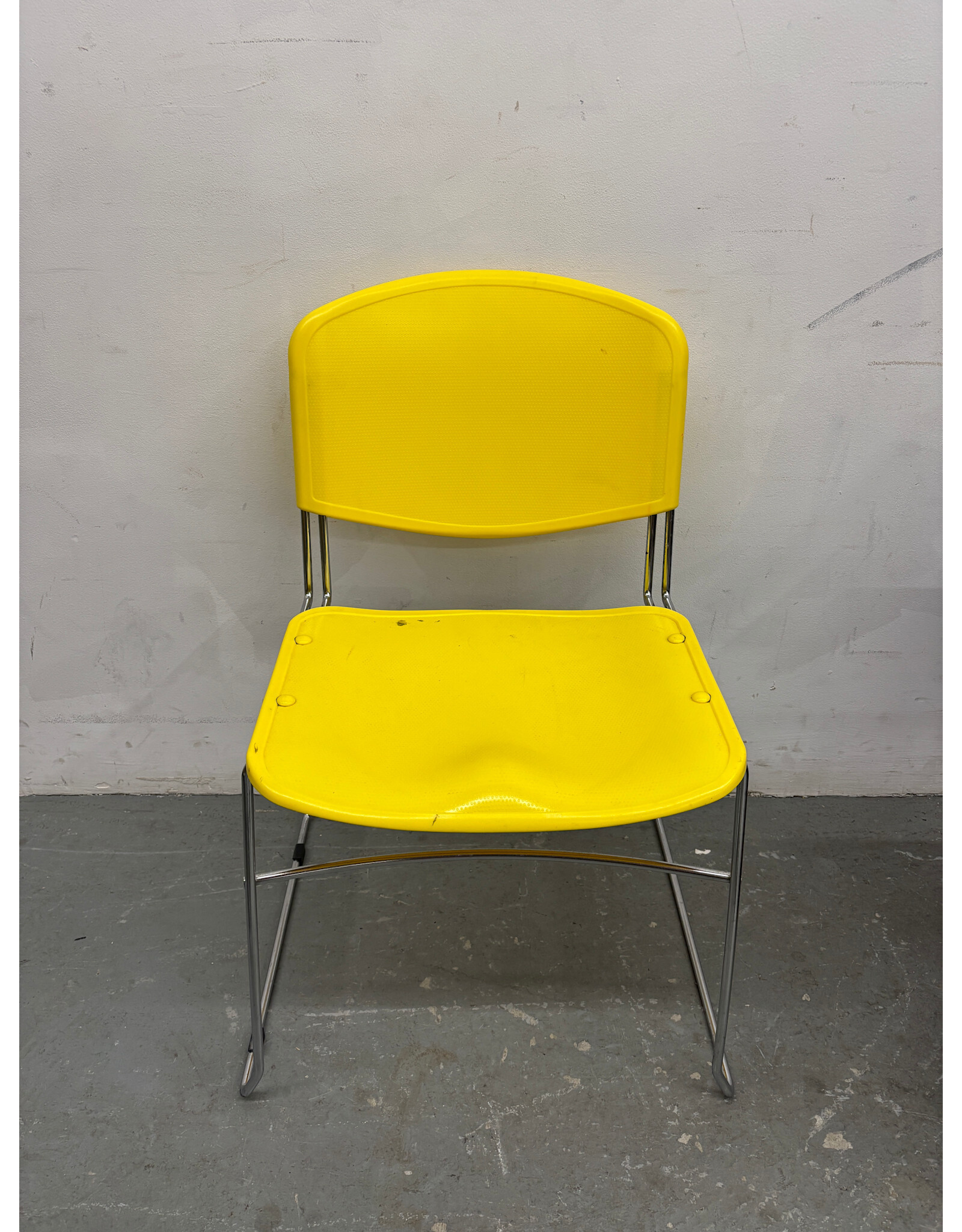 Plastic Yellow and Chrome Stacking Chair