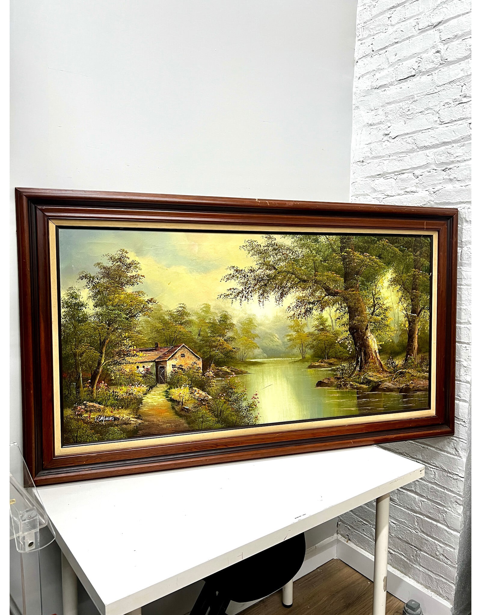Riverside Cabin, framed painting