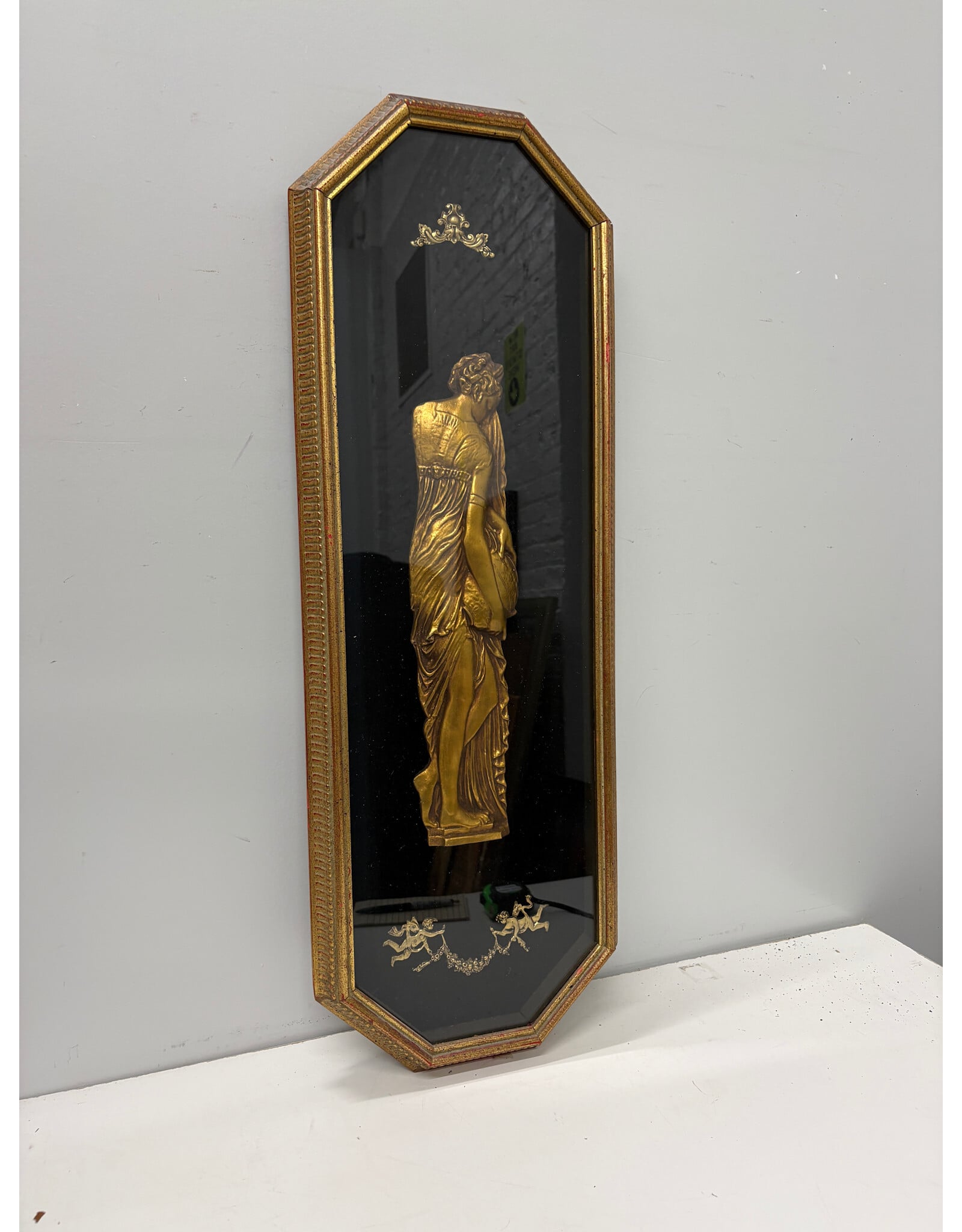 Goddess Back, gilded relief