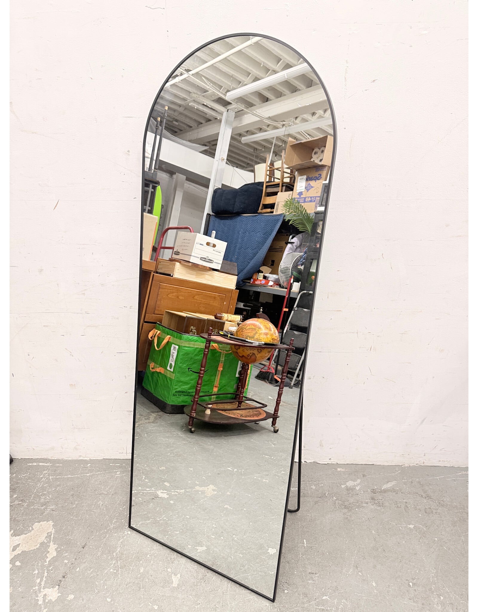 Black-Framed Arched Standing Floor Mirror