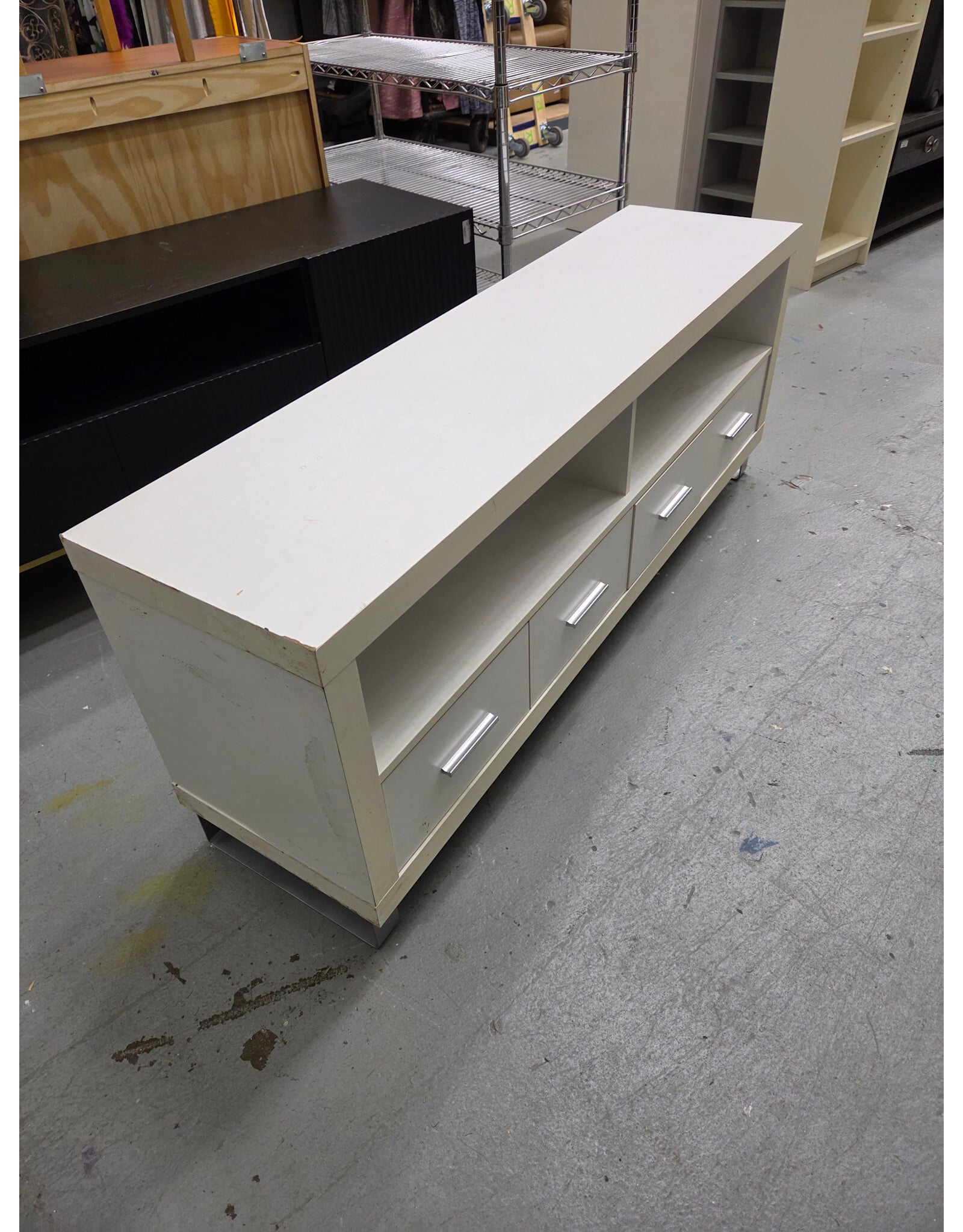 Modern White TV Stand with Four Lower Pull-Out Drawers and Open Upper Shelving Compartments
