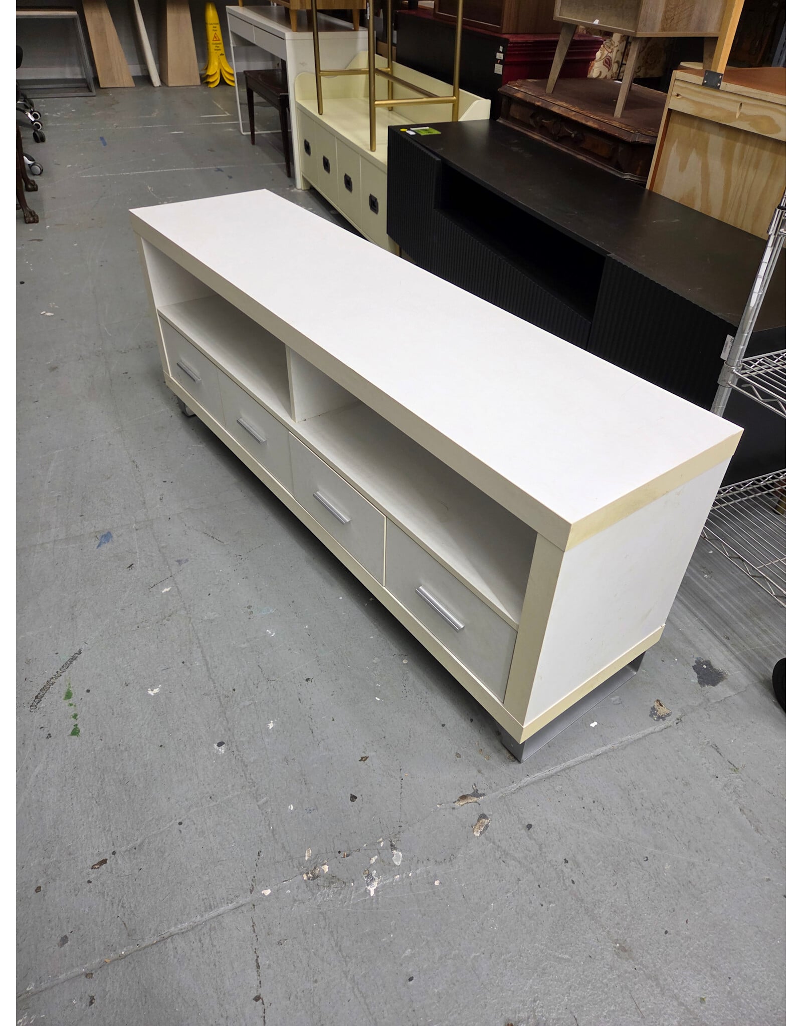 Modern White TV Stand with Four Lower Pull-Out Drawers and Open Upper Shelving Compartments