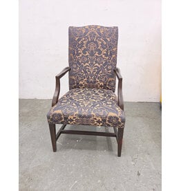 High-Back Upholstered Armchair with Dark-Stained Wooden Arms and Legs