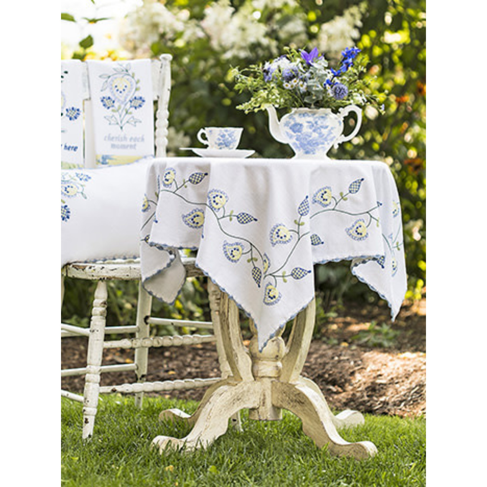 https://cdn.shoplightspeed.com/shops/642812/files/42750875/1652x1652x2/april-cornell-madelyn-embroidered-tablecloth.jpg