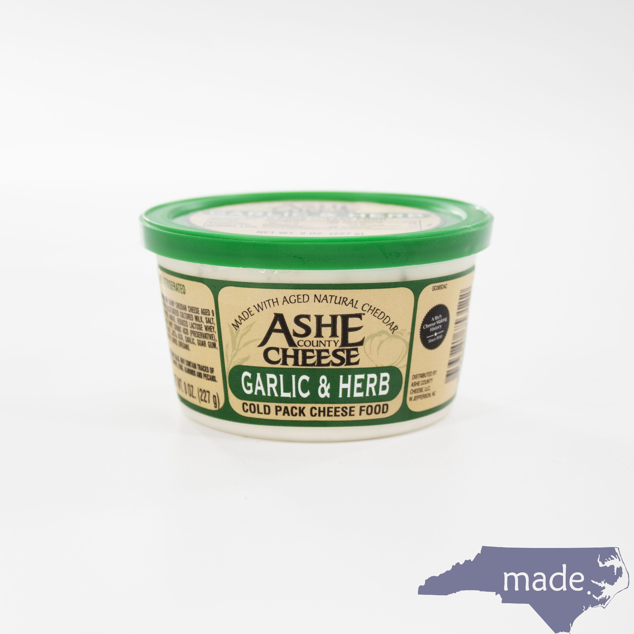 https://cdn.shoplightspeed.com/shops/642848/files/54979586/ashe-county-cheese-garlic-herb-cheese-spread-ashe.jpg