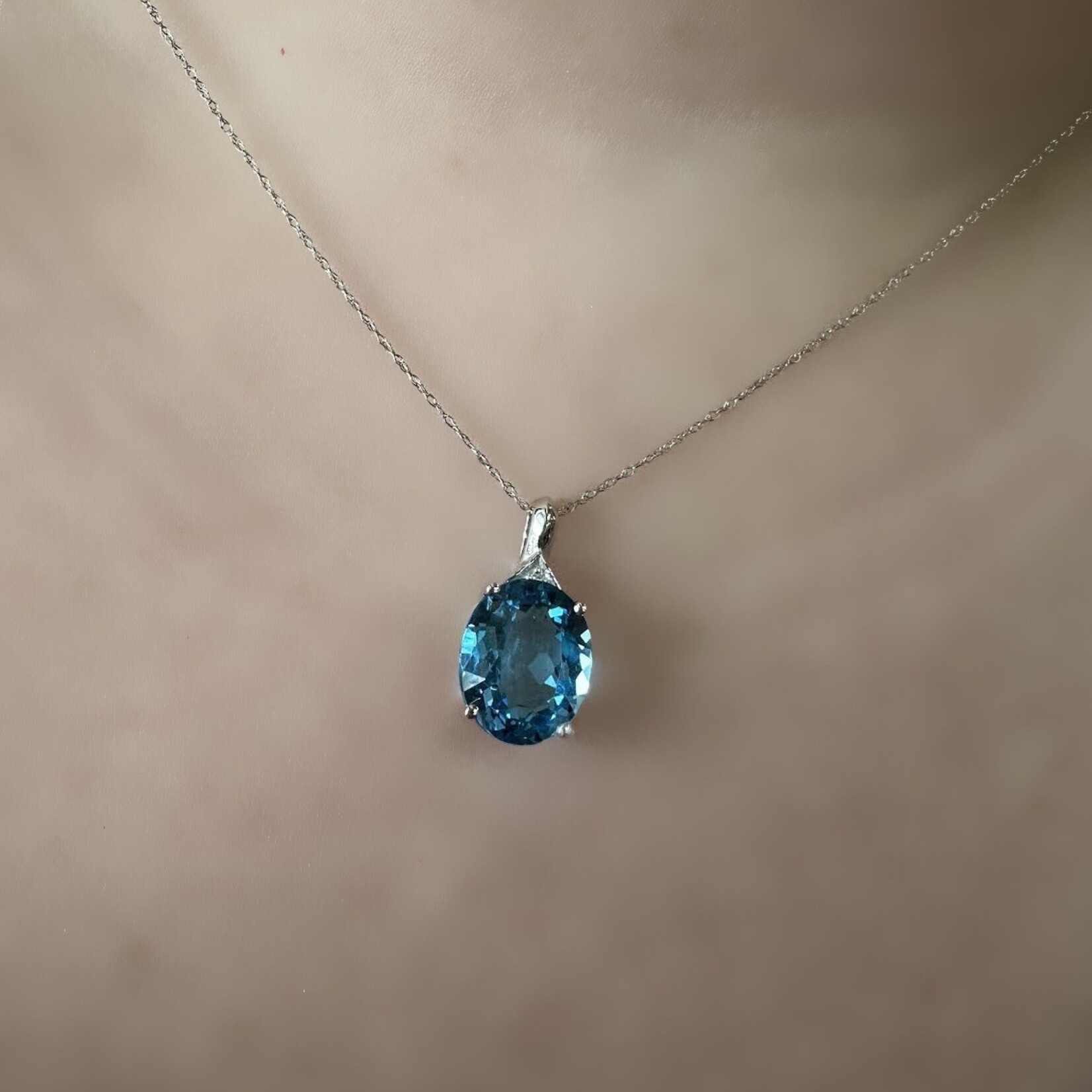 10k White Gold Oval Blue Topaz Pendant with Chain