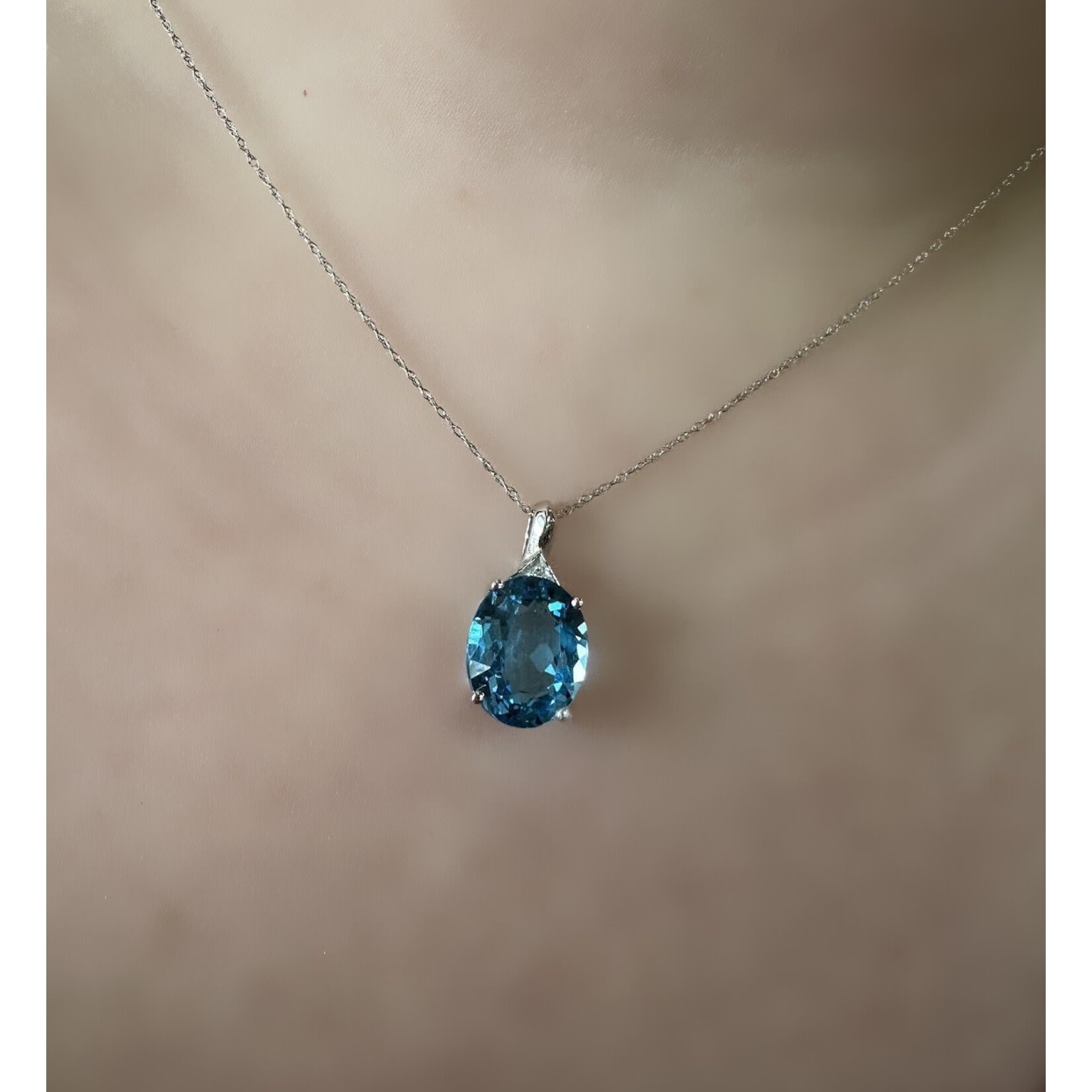 10k White Gold Oval Blue Topaz Pendant with Chain