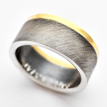 rings silver and gold carbon laminate