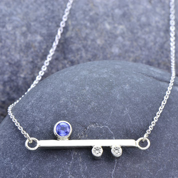 minimal 0.30ct sapphire and diamond 14k white x axis bar pendant