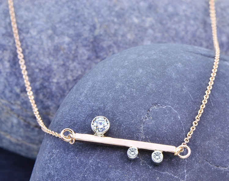 minimal 0.28cttw diamond 14k rose x axis bar pendant