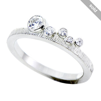 topstack 0.25ct round diamond 14k white knockout mini topstack