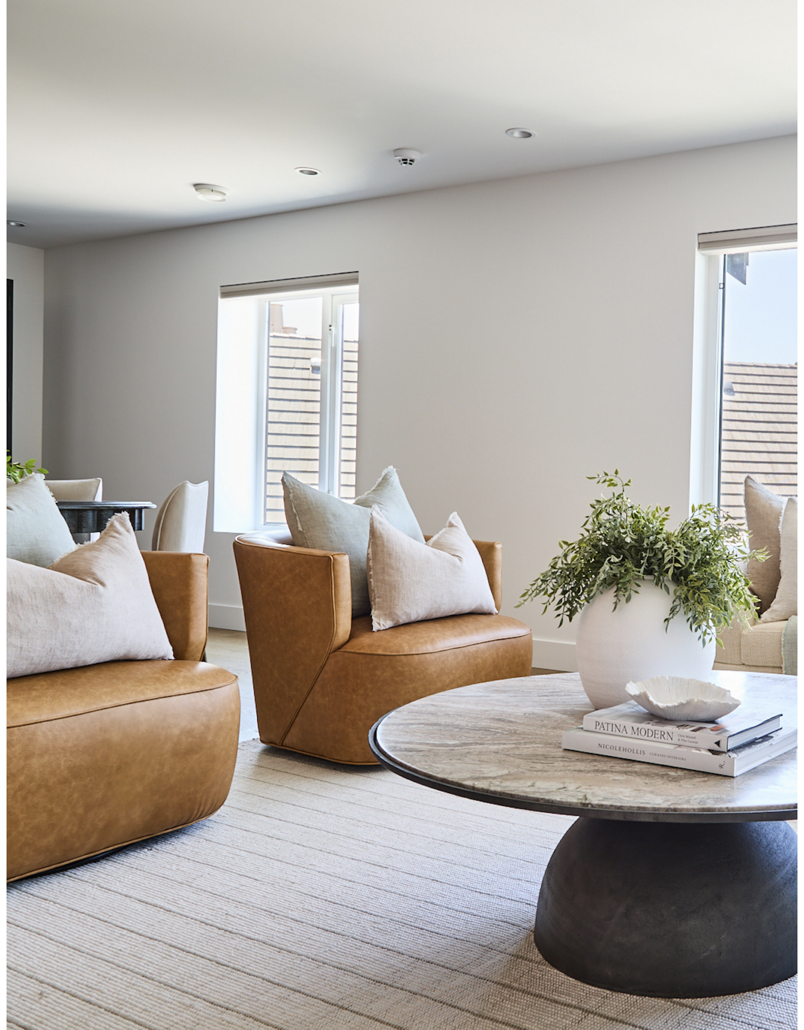 Mila Swivel Chair in Camel Leather