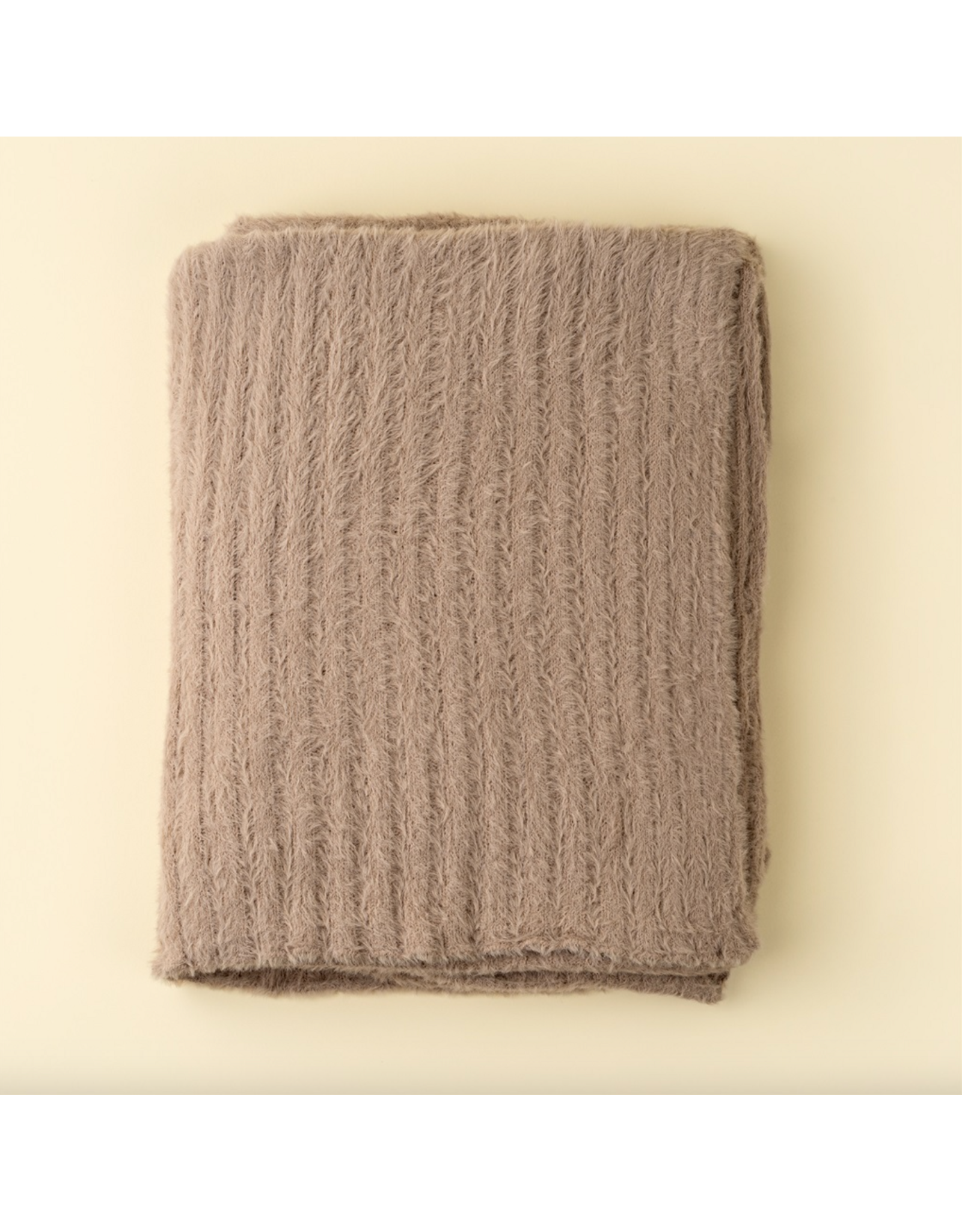 Snug Throw, Tuffet