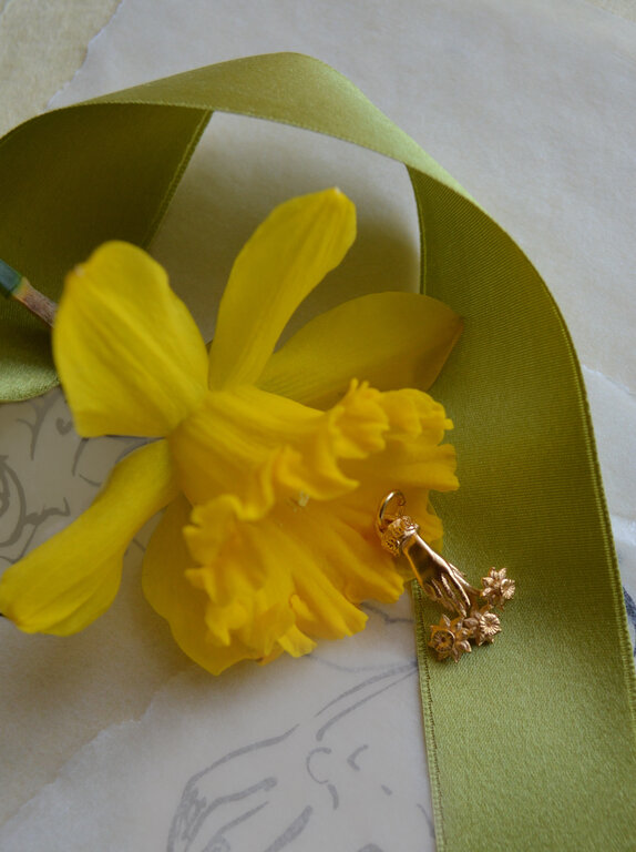 Fallen Aristocrat Hand with Daffodils Charm