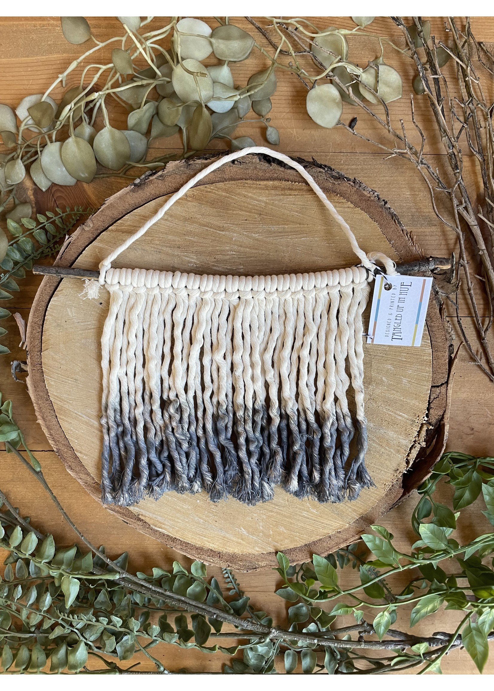 https://cdn.shoplightspeed.com/shops/643147/files/52904862/1652x2313x2/tangled-up-in-hue-wholesale-dip-dyed-macrame-wall.jpg