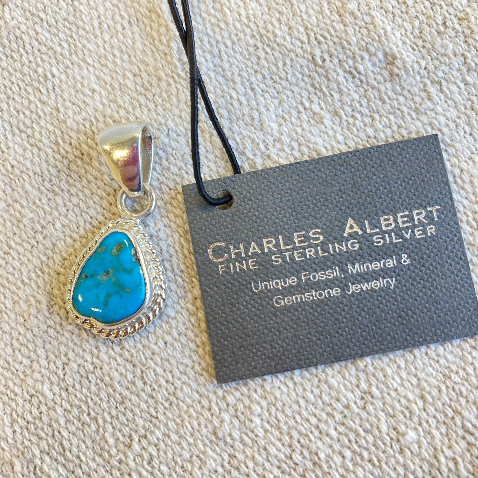 Charles Albert Sterling Silver Turquoise Pendant