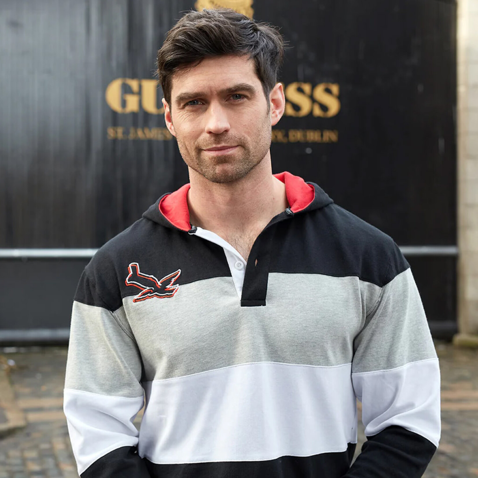 SPORTSWEAR GUINNESS RED & BLACK TOUCAN HOODED RUGBY