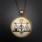 Justice Talisman in Antique Brass with Glass Cabochon