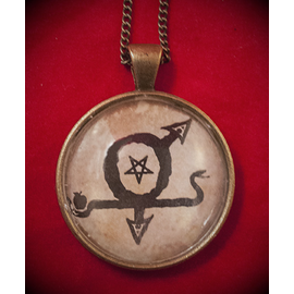 Gay Lust Talisman in Antique Brass with Glass Cabochon