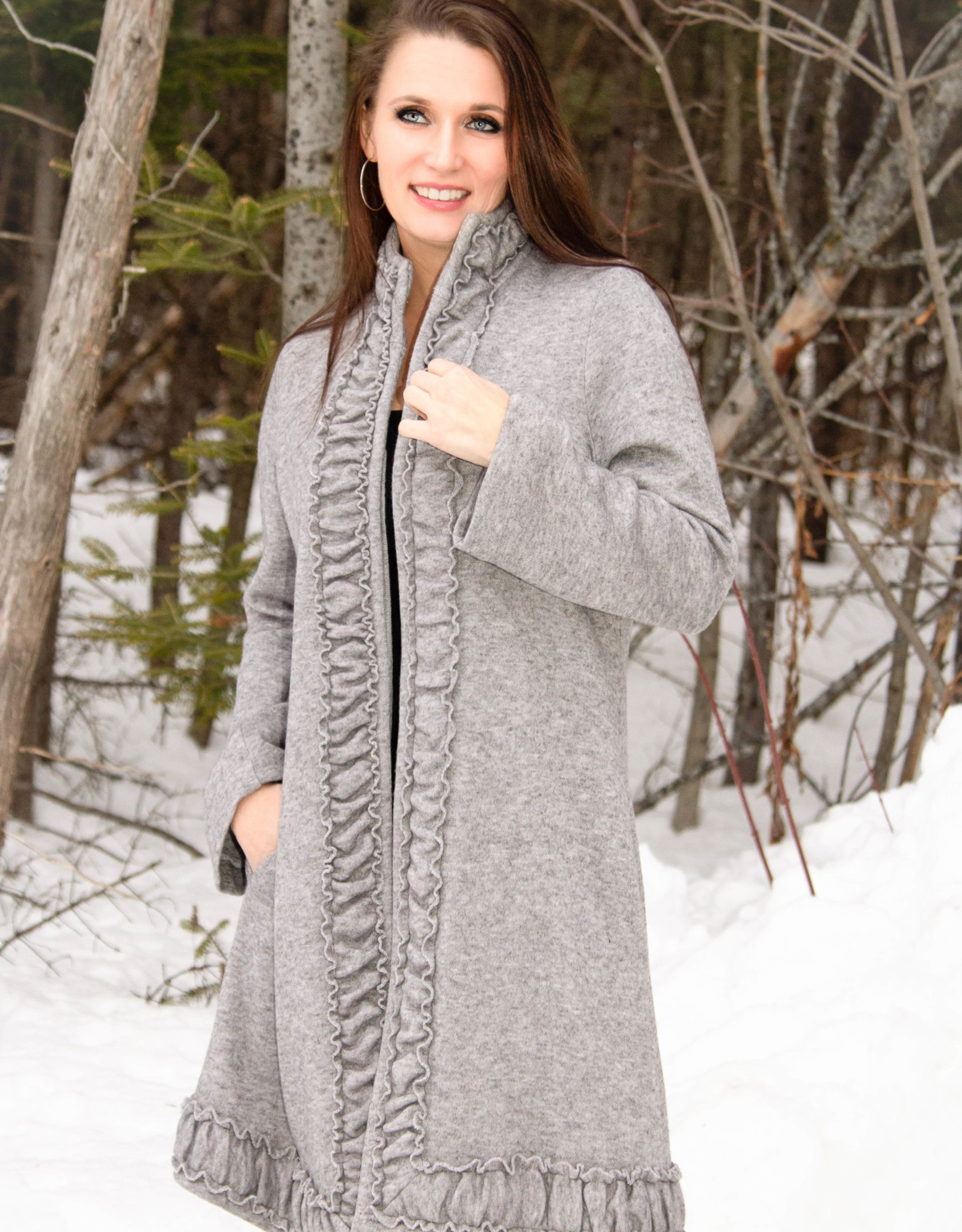 Pure Essence Pure Essence 379-4720 Long Sleeve Sweater Coat With Small Ruffle Collar and Hemline and it has Pockets