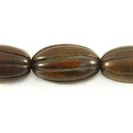 Burnt horn carved oval bead