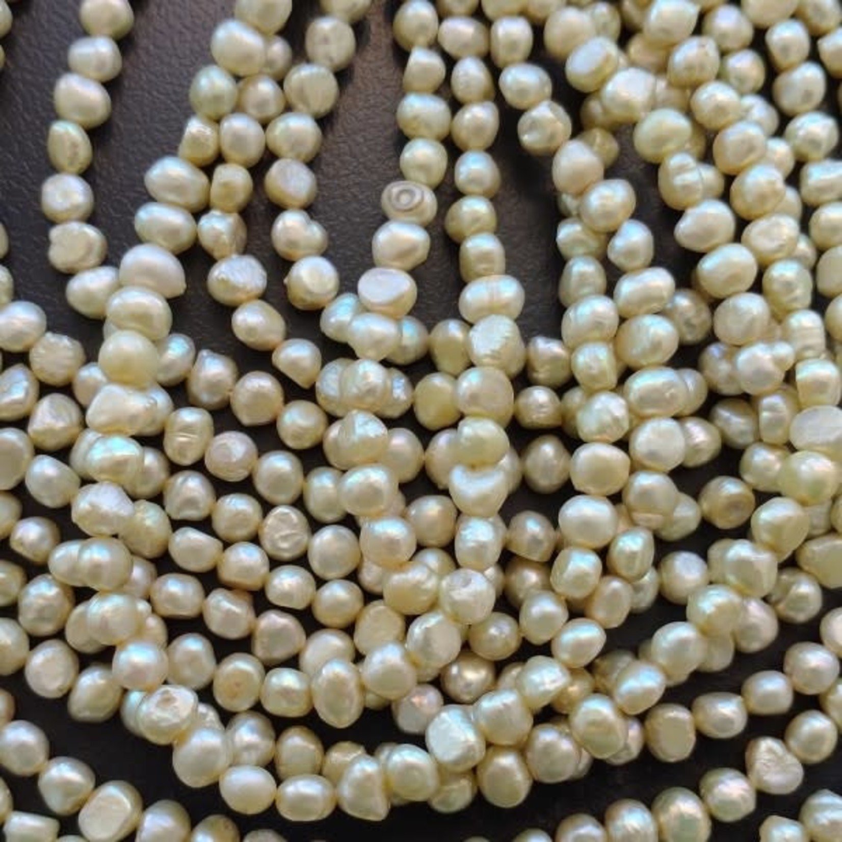 Freshwater Pearl strand - 4-6mm Flattish lime light