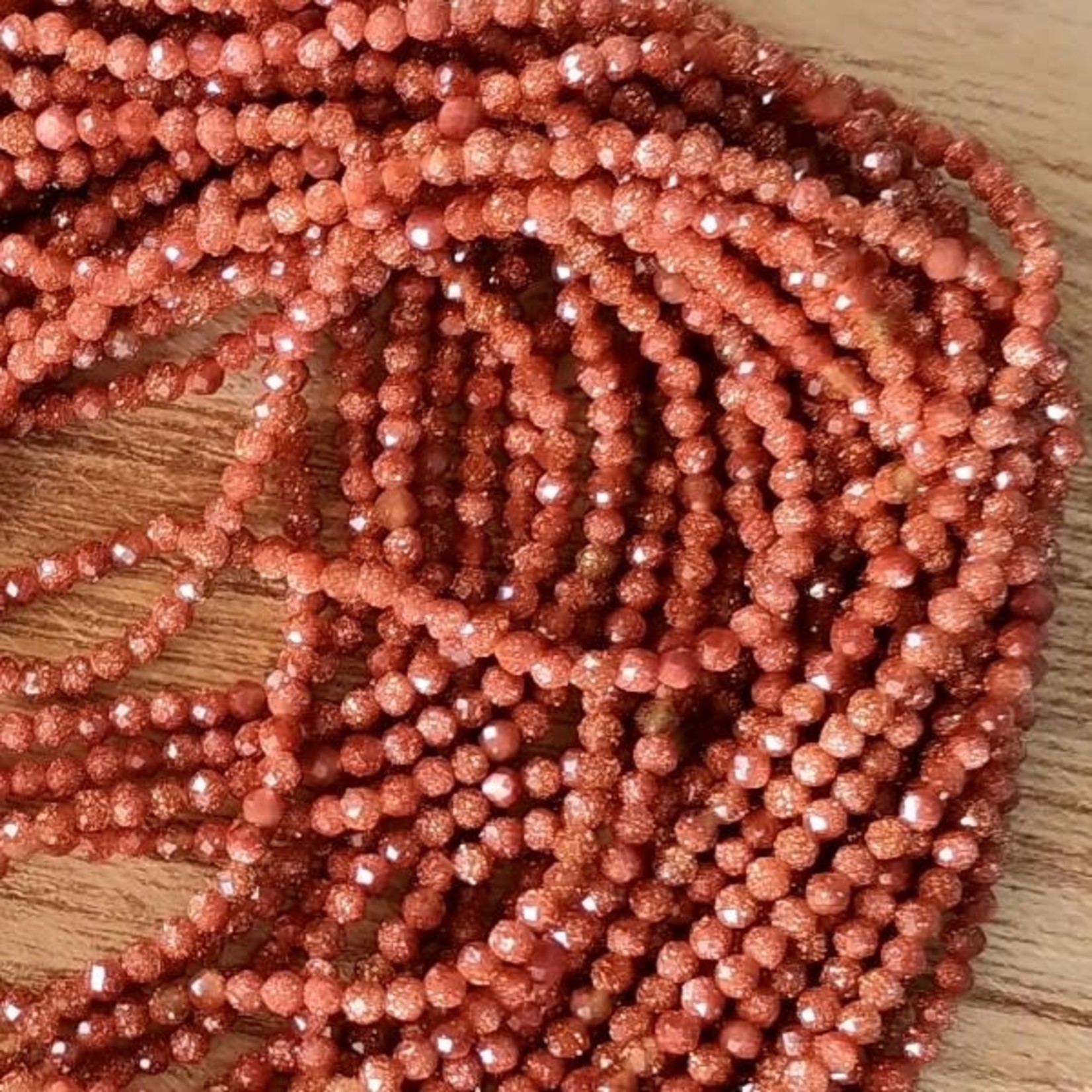 Goldstone 2mm Bead Strand