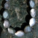 Carved Mother of Pearl Black Teardrop - Black Faceted 19x11mm