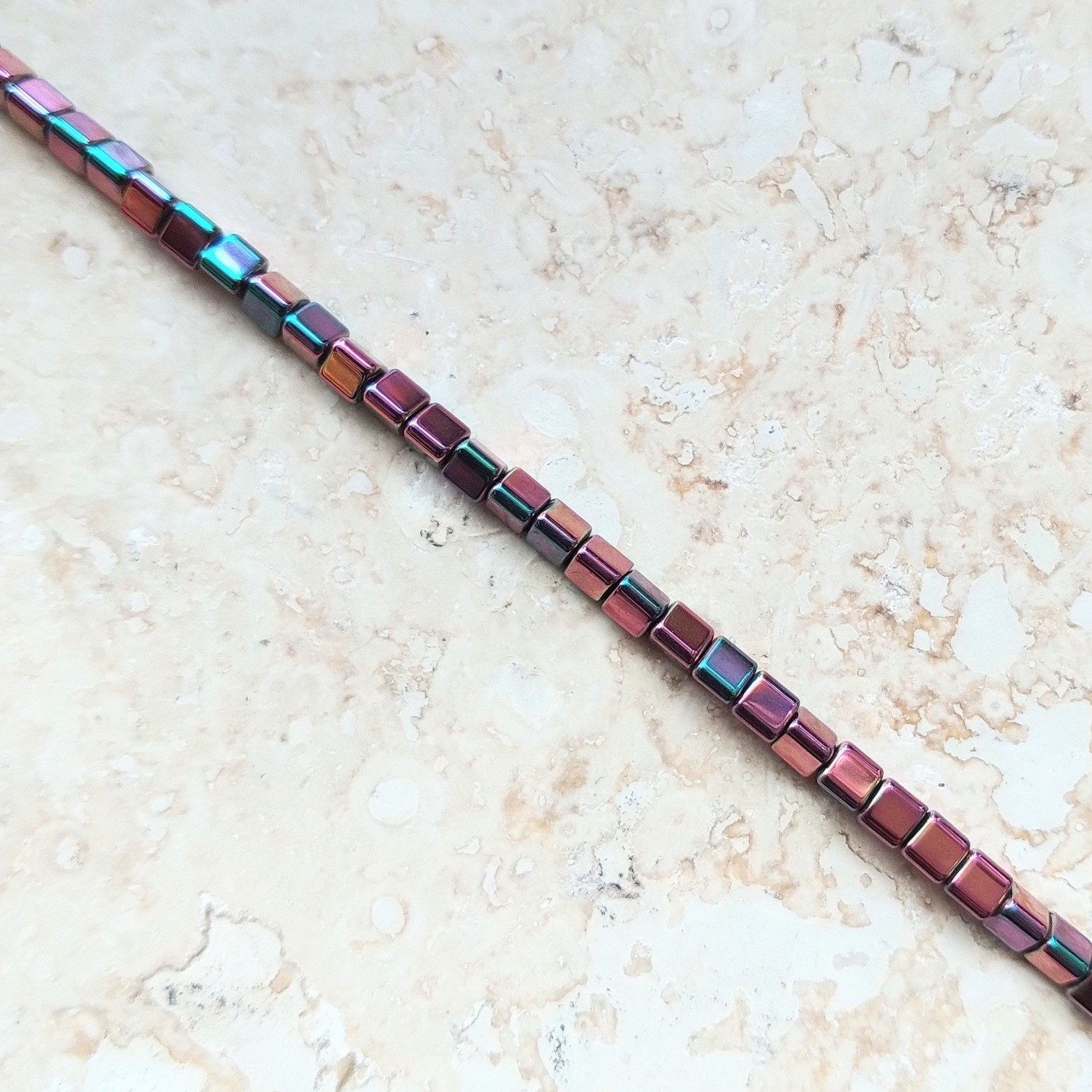 Hematite  2x3mm Triangle Rainbow Bead Strand