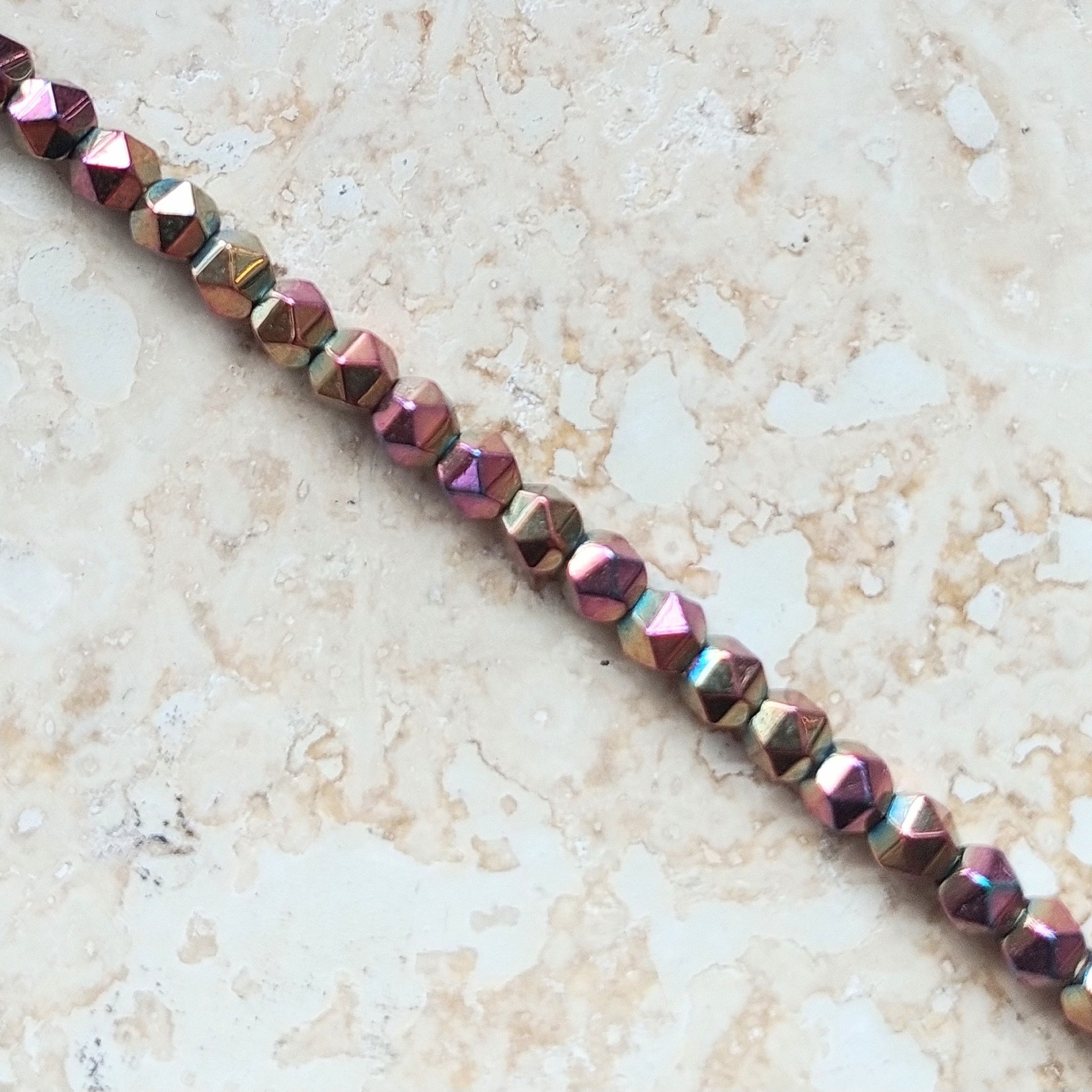 Hematite  3mm Dodecahedron Rose AB Bead Strand